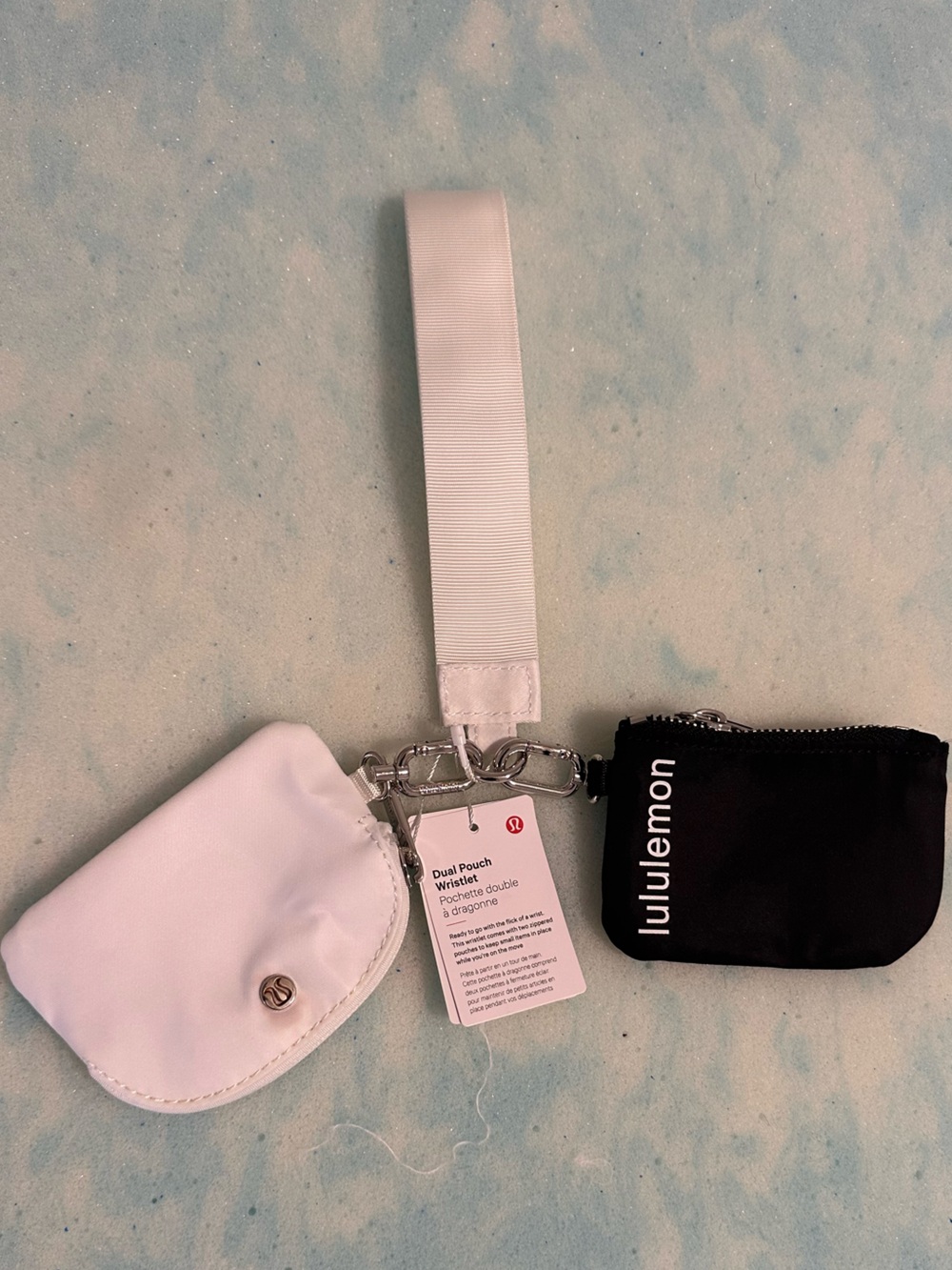 Black and white key chain and wristlet